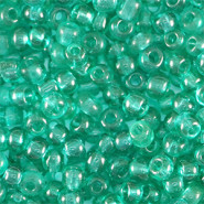 Glasperlen rocailles 8/0 (3mm) Transparent petrol green